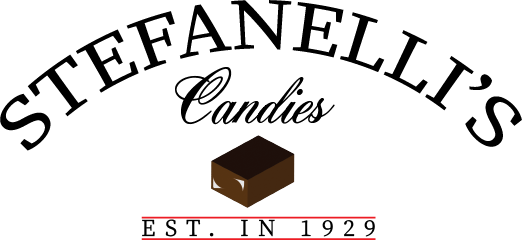Rounded Stefanelli's with cursive Candies. 3D block of chocolate and Est. in 1929 underneath.